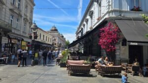 Sunny day at vibrant street cafes in Knez Mihailova, the beautiful main pedestrian zone in Belgrade.